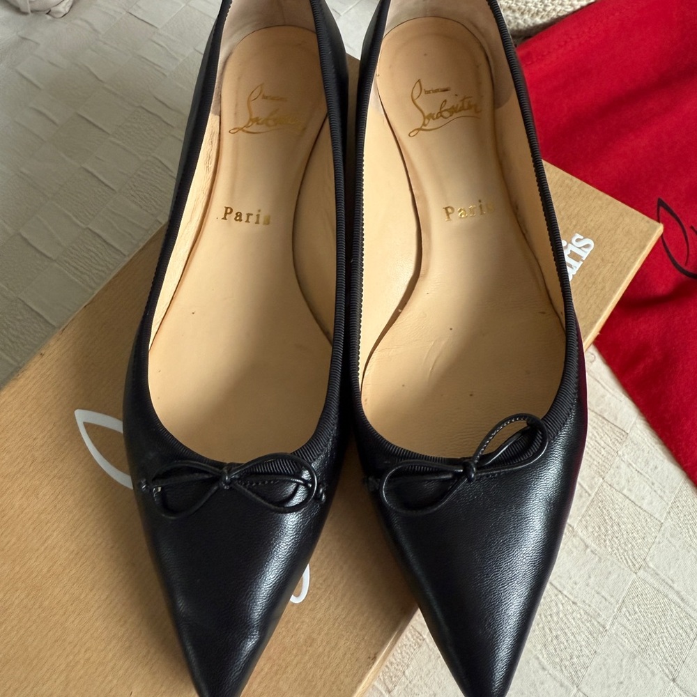 Christian Louboutin Black Nappa Spiked Flats with Bow Detail (size 37.5)